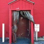 red doorway, fire lane sign
