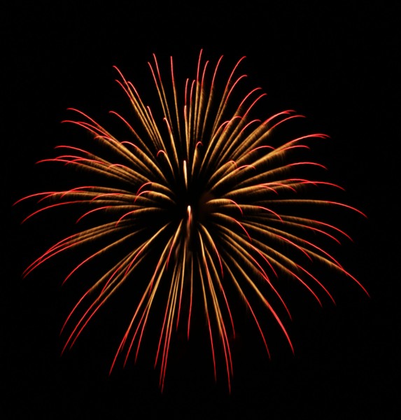fireworks single burst of red orange yellow and white
